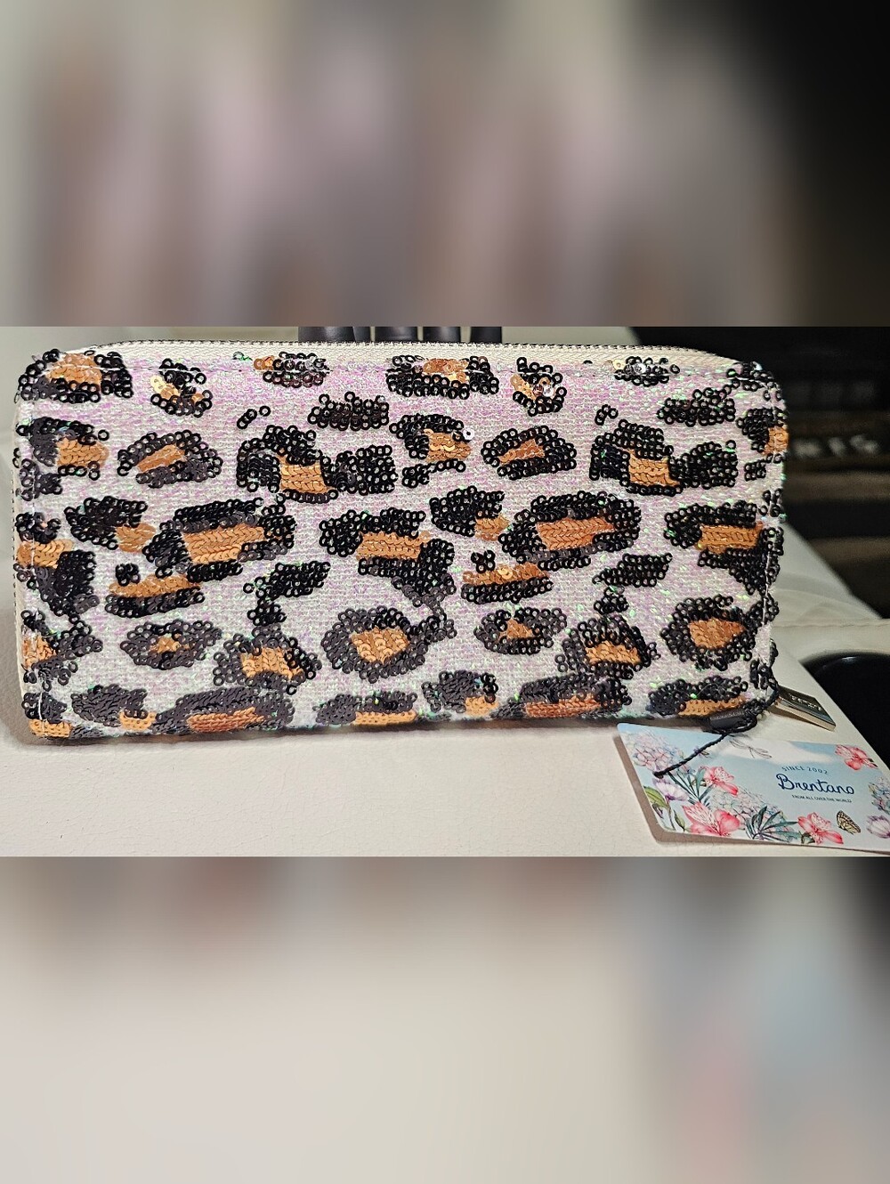 B. Brentano RFID blocking single-zipper wallet clutch featuring a wristlet strap